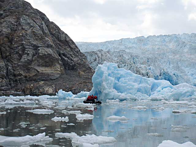 Exploring icebergs by Zodiac