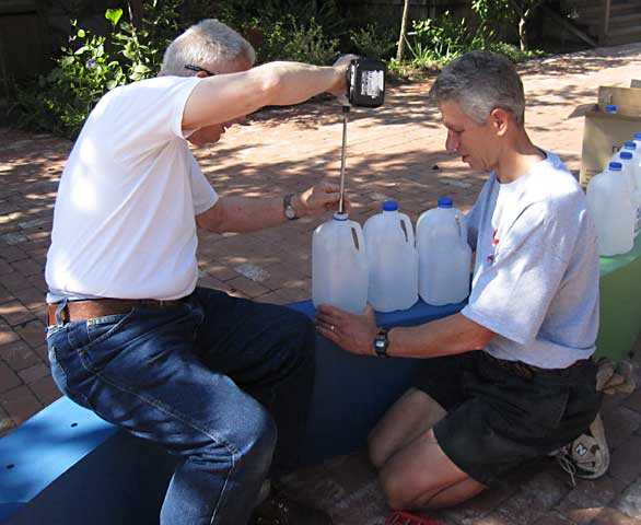 Attaching one of 153 One Gallon Water Bottles