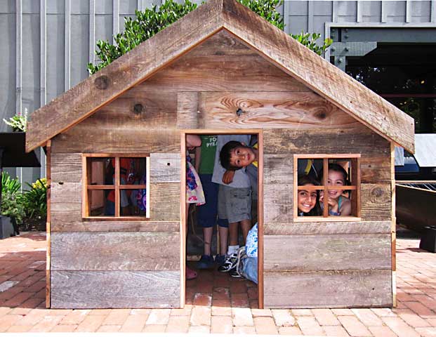 Children playing inside Green Roof Playhouse