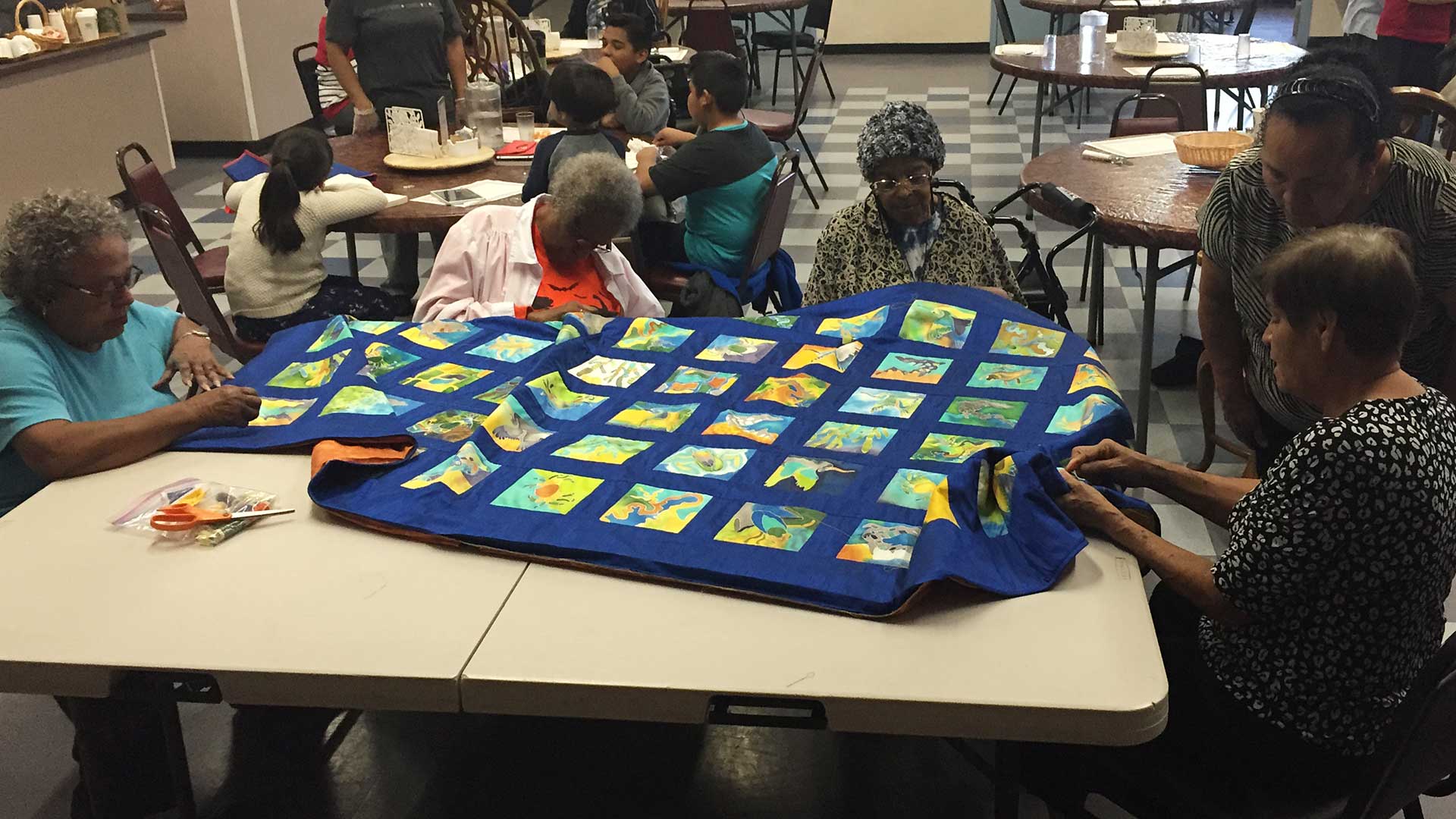 Hand quilting at the East Palo Alto Senior Center