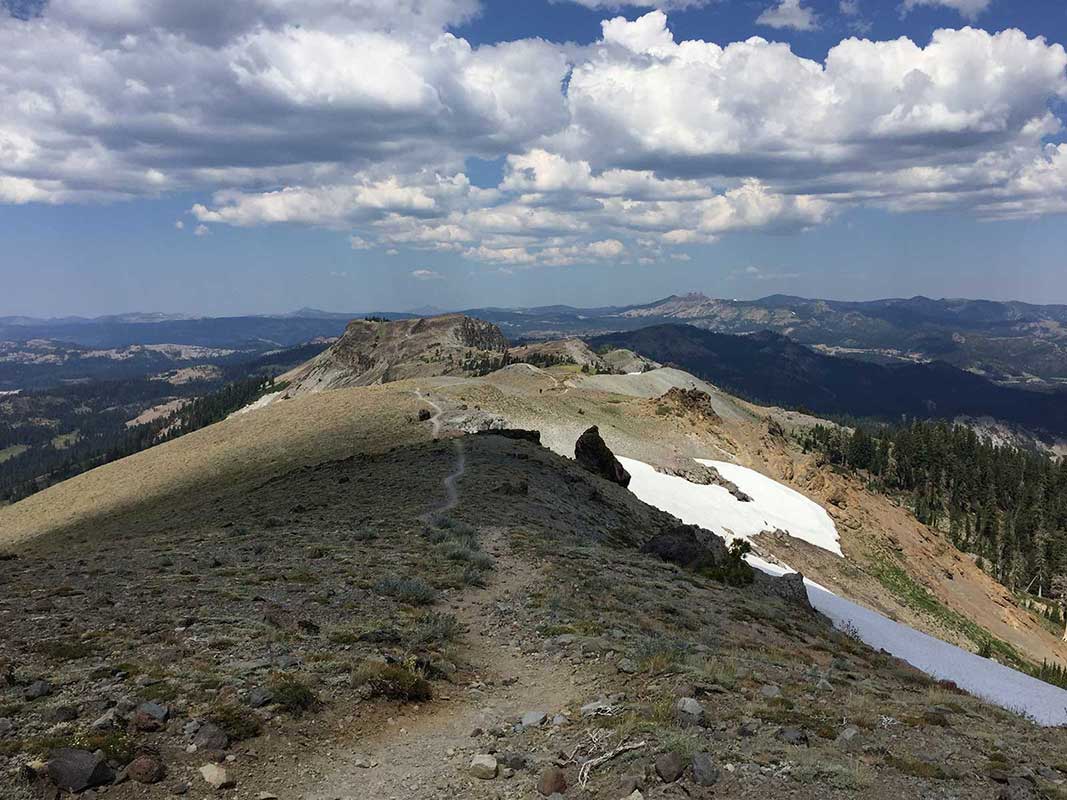 Walking Sierra Crest near Lake Tahoe with thunderclouds forming