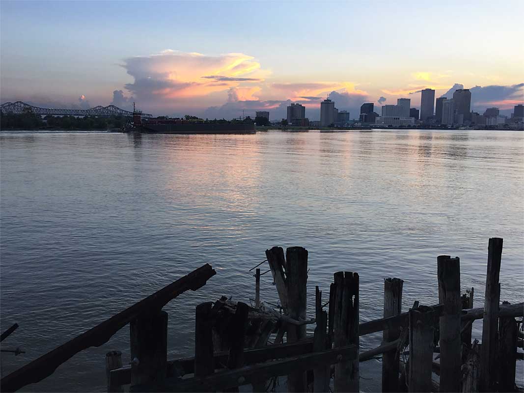 Sunset on Mississippi River with New Orleans in backgound