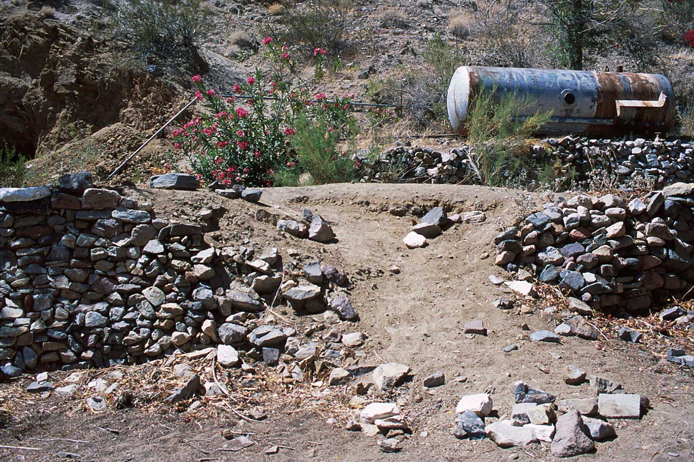 View of collapsed dry stack wall without fabric. At Warm Springs, Death Valley ©2000 Linda Gass
