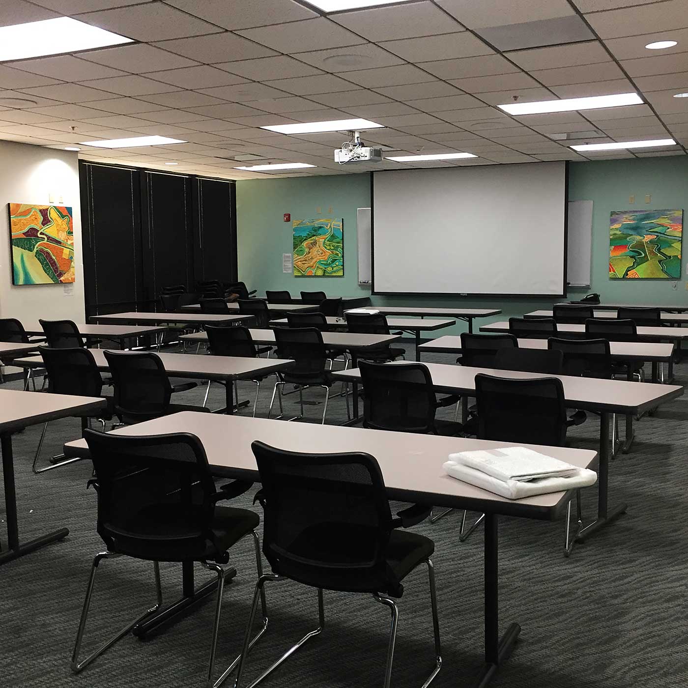 Metal prints of artwork in conference room at Alameda County Department of Environmental Health